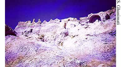 The high walls of a terrace that houses the fire temple of the Kuh-e Khwaja complex, Lake Hamun, eastern Iran (circa 200-800 A.D.).