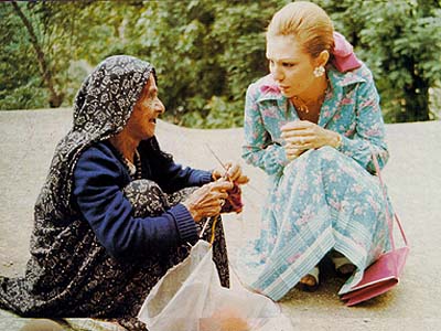 ROYALTY AND THE PEOPLE:Farah chatting with a local lady in Gilan Province (1970's)