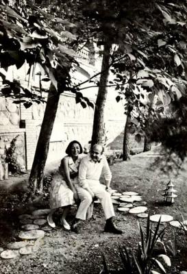 pictory: Ami Abbas Hoveida and wife in their Home Garden (1974)