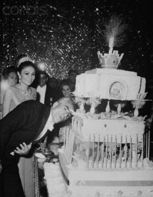 pictory: Shah Blows Candle on Birthday Cake 
