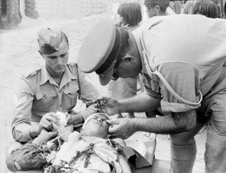 pictory: Allied Troops Bring Medical Aid to Iranian Children during WW 2 (1940's)